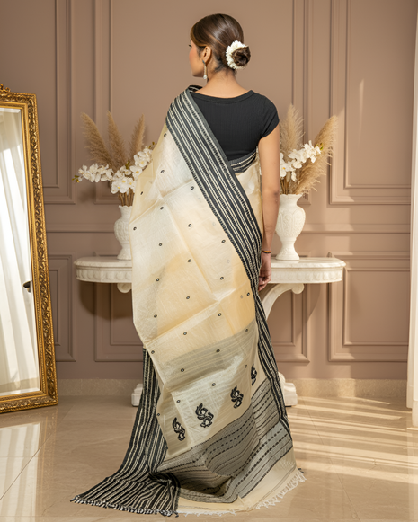 Vibrant Golden Tussar Saree with Traditional Assamese Motif & A Broad Woven Black Border With Blouse Piece
