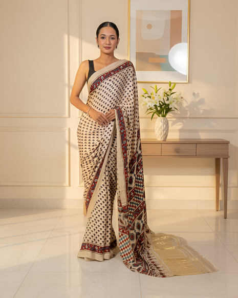 Cream Colour Ajrak Print Modal Silk Saree With Blouse Piece