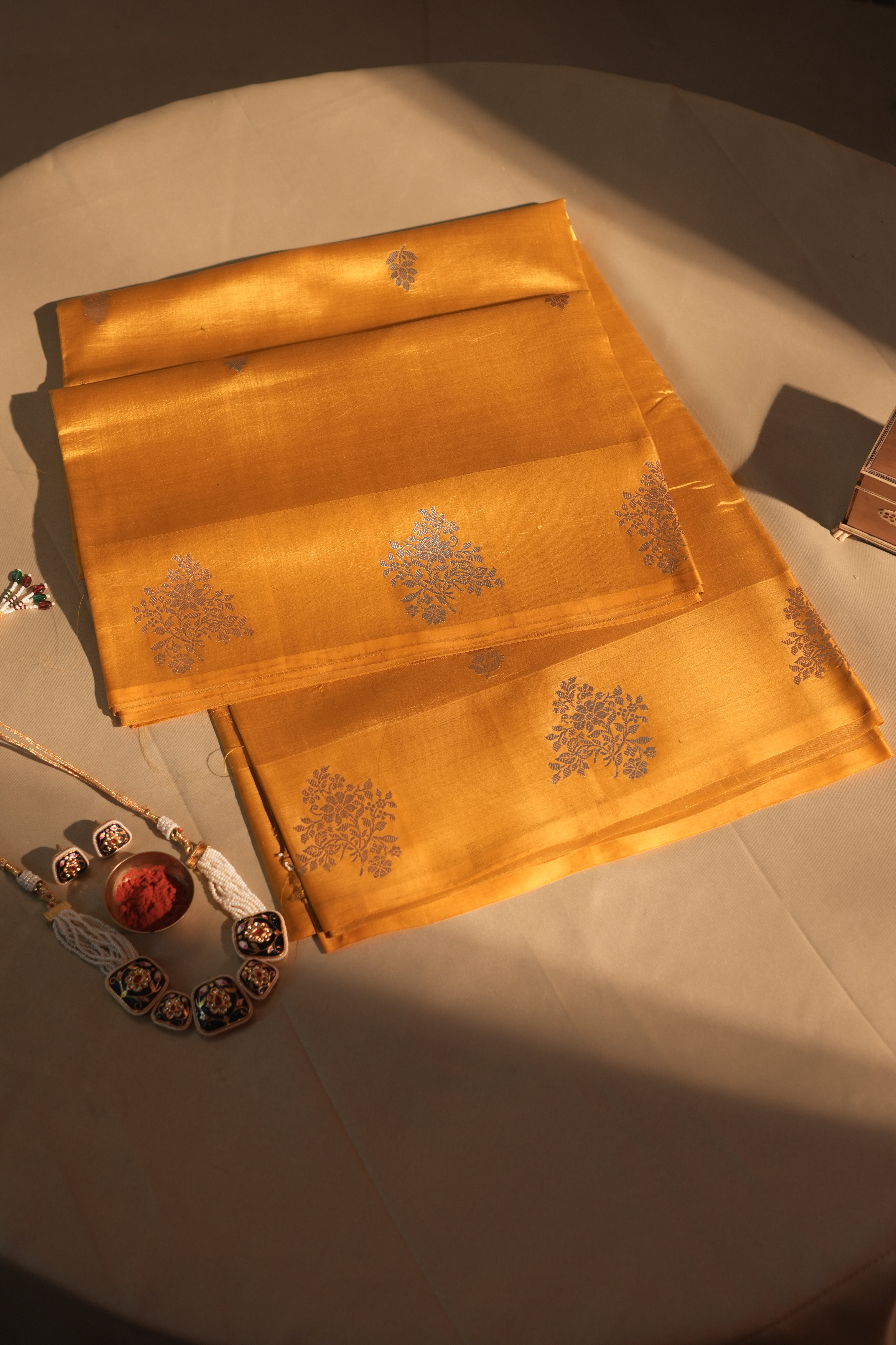 Deep Yellow Floral Butti Border Banarasi Silk Saree With Blouse Piece