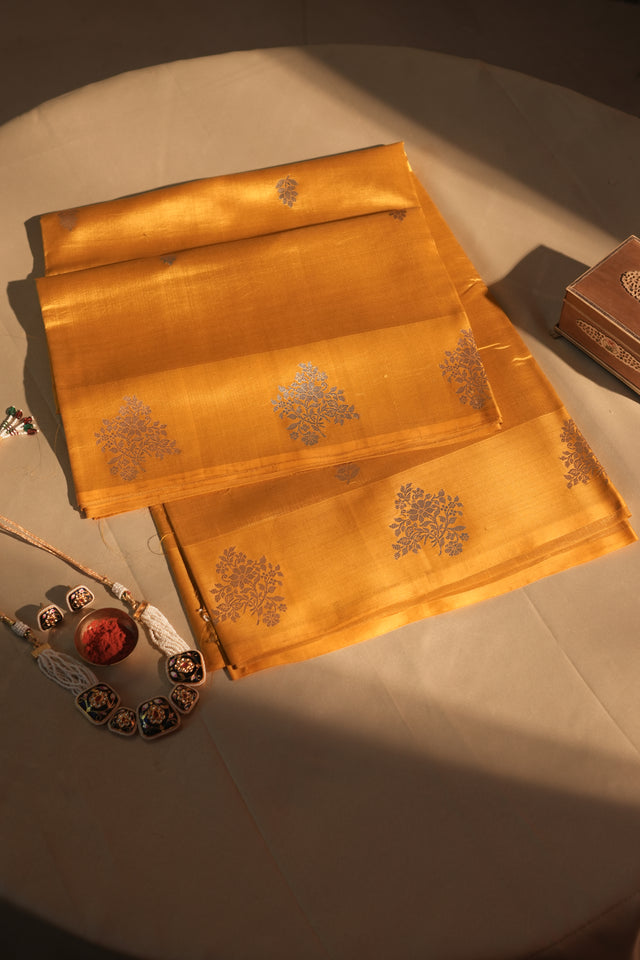 Deep Yellow Floral Butti Border Banarasi Silk Saree With Blouse Piece
