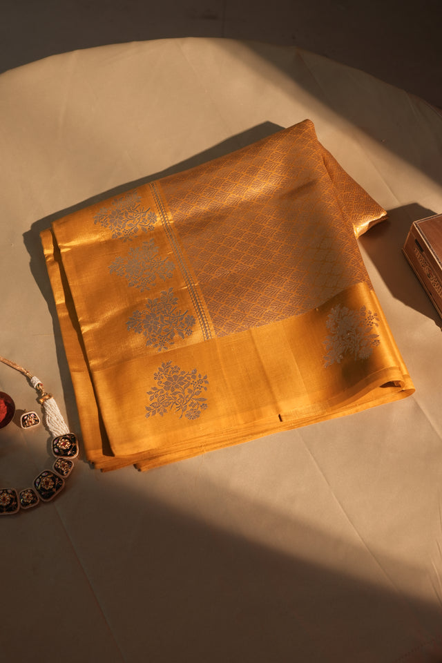 Deep Yellow Floral Butti Border Banarasi Silk Saree With Blouse Piece