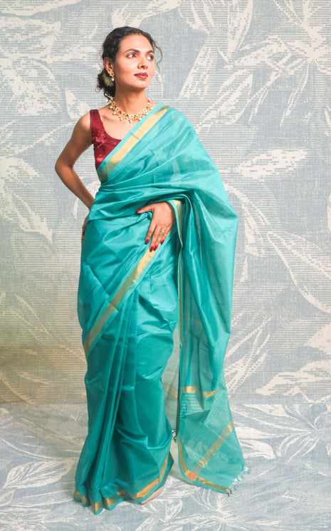 Sea Green Color Plain Paturi Silk Saree With Silver Zari Border