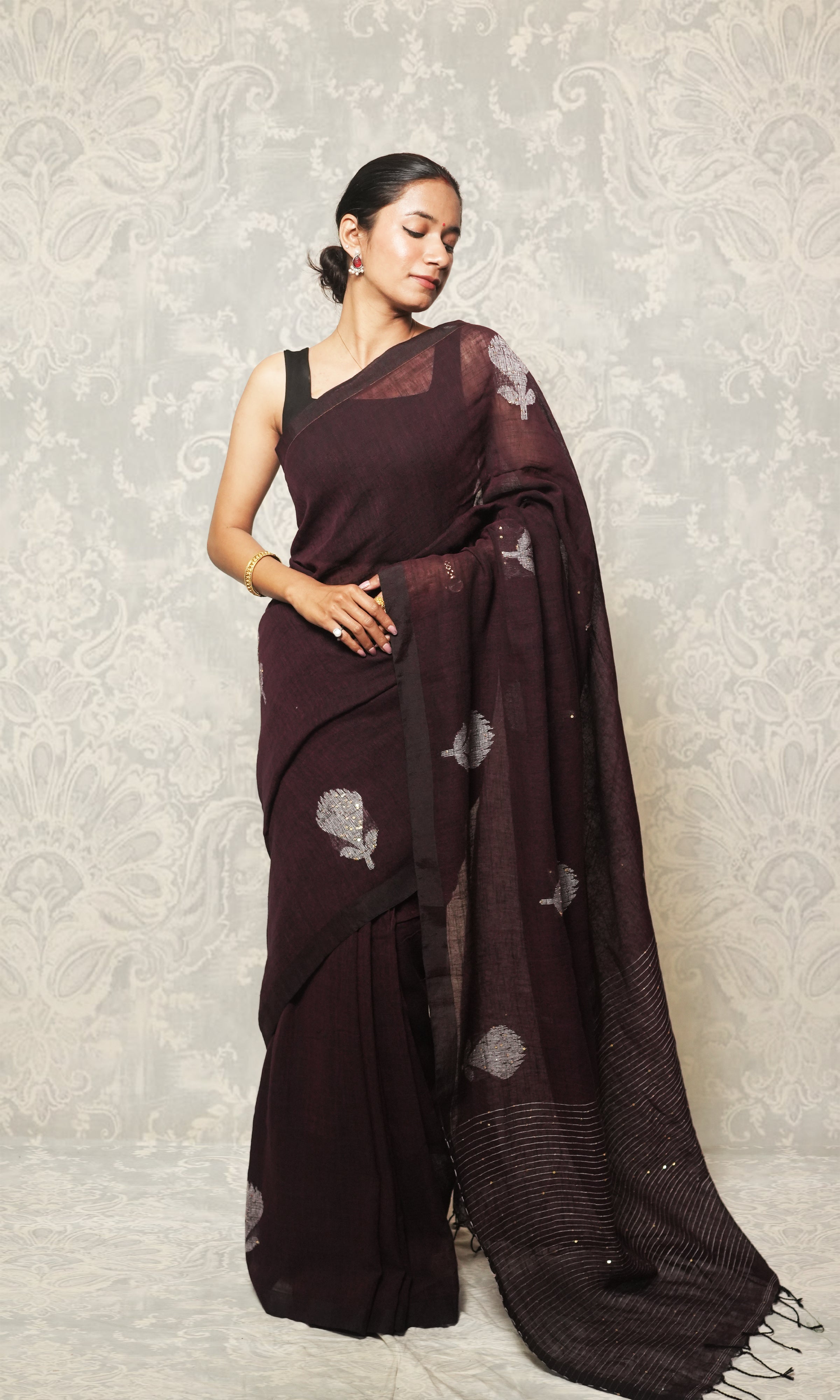 Wine Color Linen Saree With White Thread And Sequin Embroidery