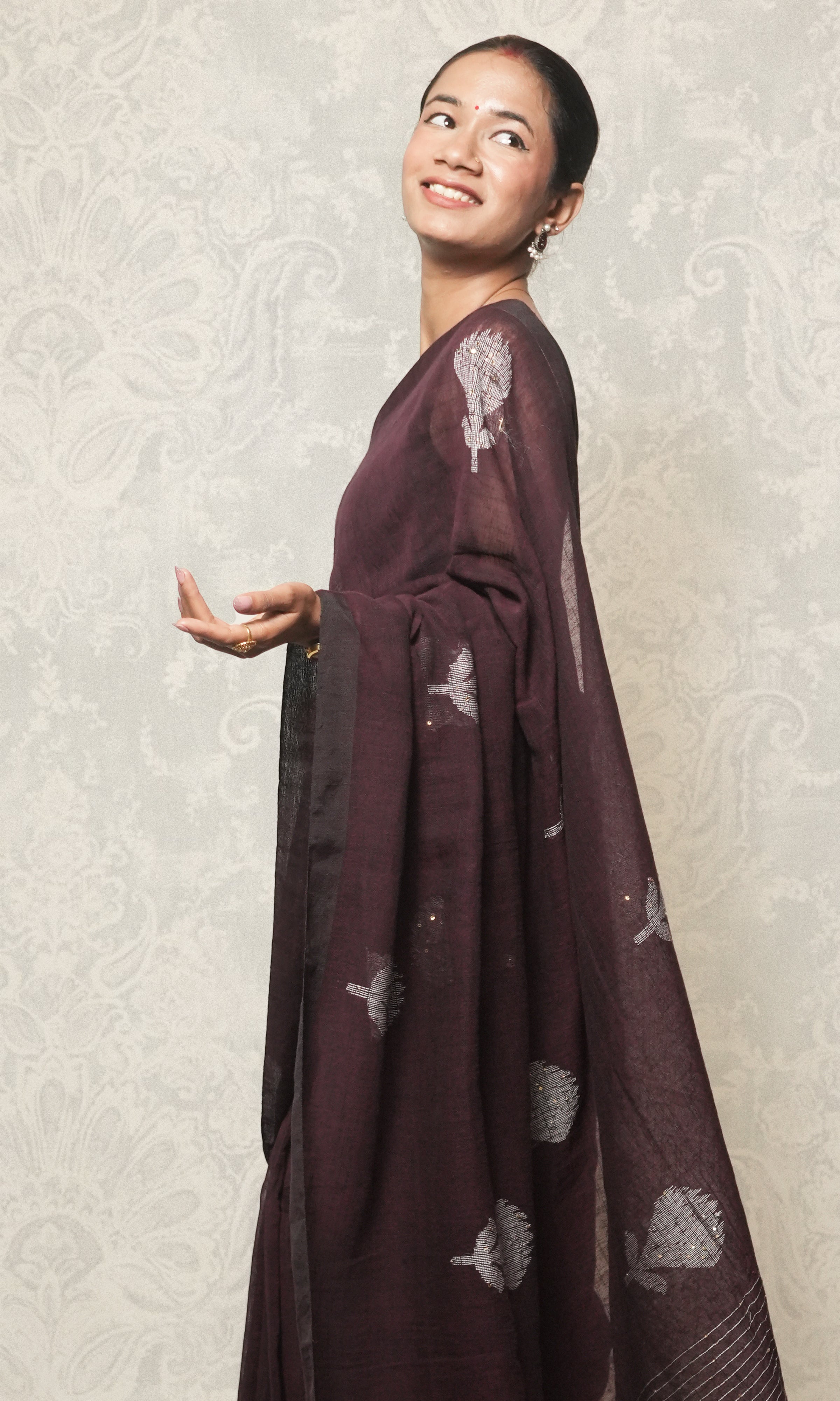 Wine Color Linen Saree With White Thread And Sequin Embroidery