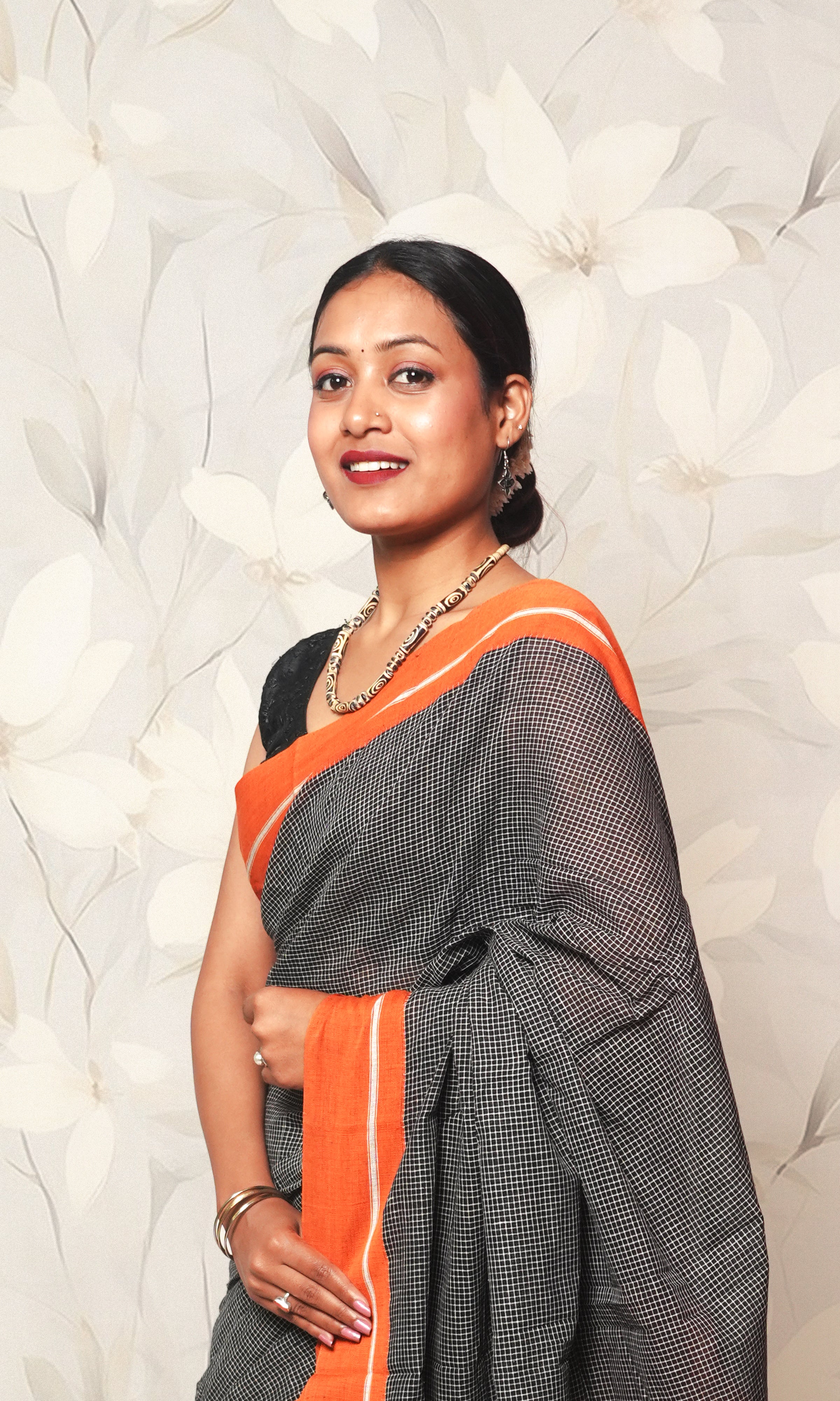 Earthy Black And Orange Patteda Anchu Cotton Saree